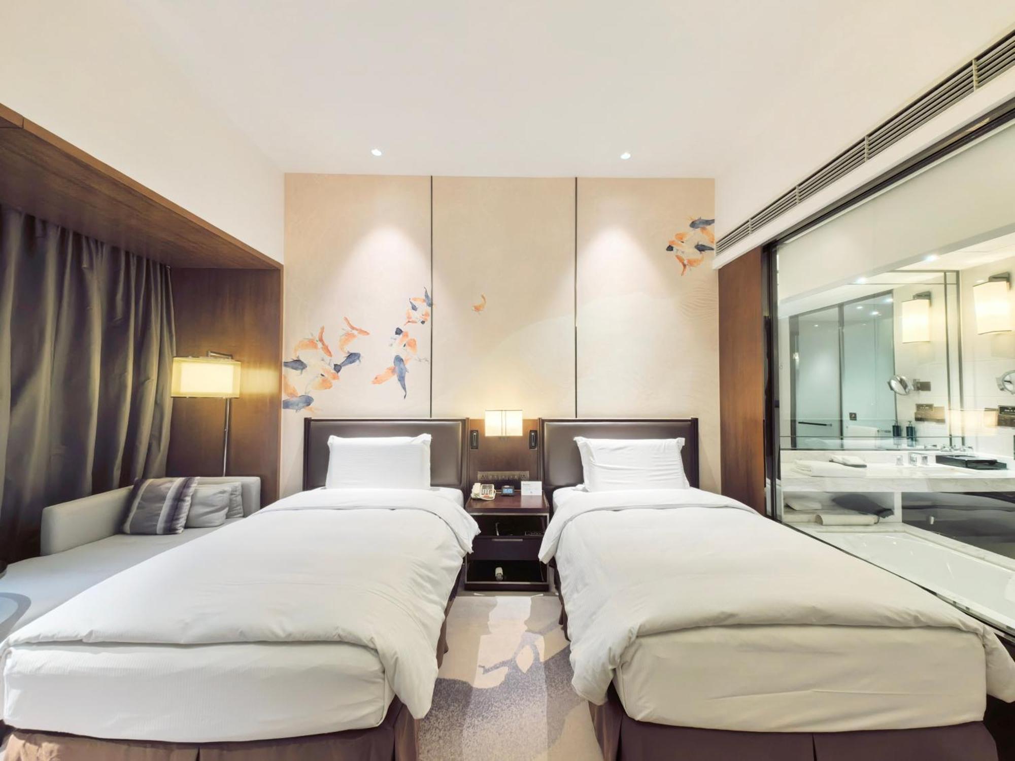 Отель Doubletree By Hilton Ningbo Beilun Экстерьер фото